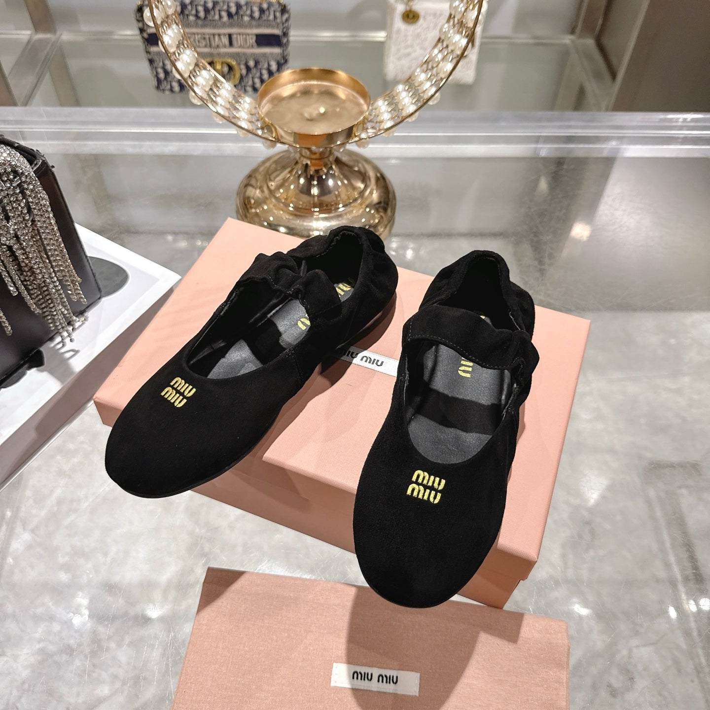 Miu 26s Mary Jane Flats In Black Suede Elastic Strap