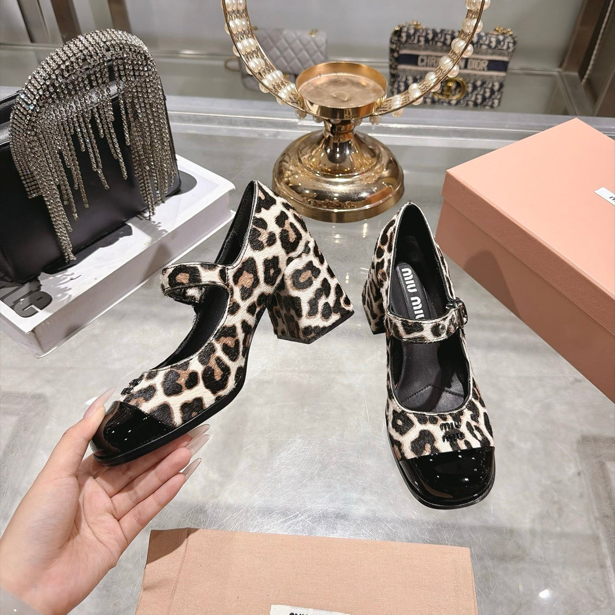 Miu Miu FW26 Two-Tone Mary Jane Pumps 75mm Leopard Pony Hair Black Patent 190484