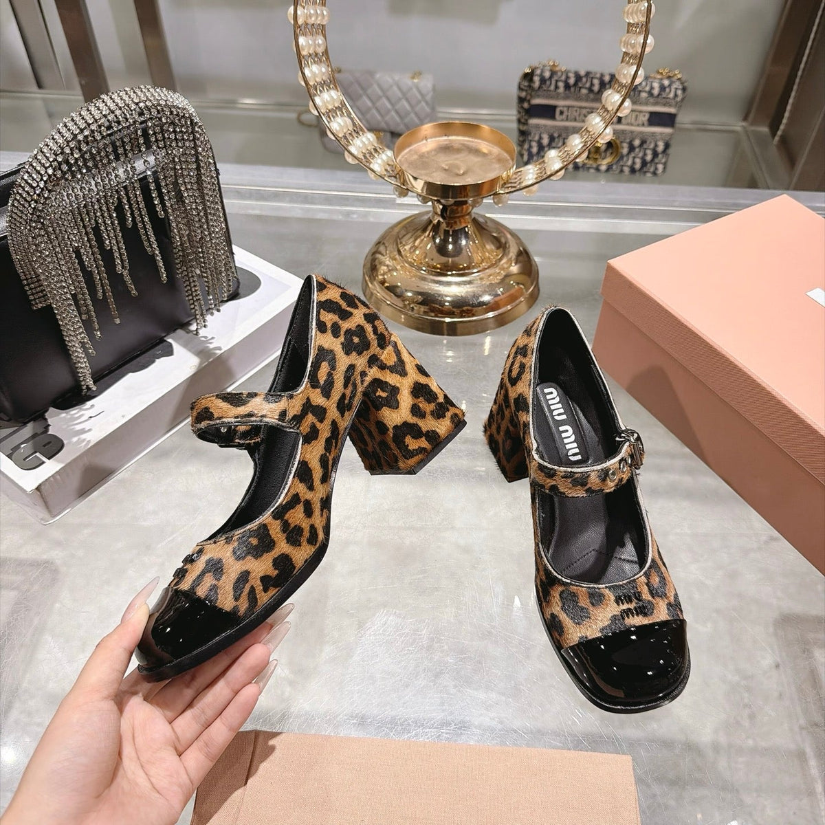 Miu Miu FW26 Two-Tone Mary Jane Pumps 75mm Leopard Pony Hair Black Patent 190485