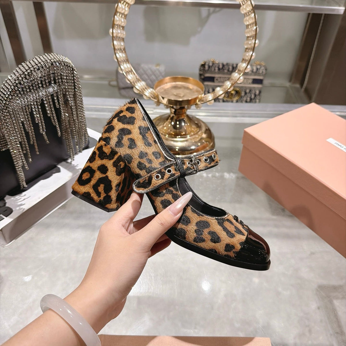 Miu Miu FW26 Two-Tone Mary Jane Pumps 75mm Leopard Pony Hair Black Patent 190485