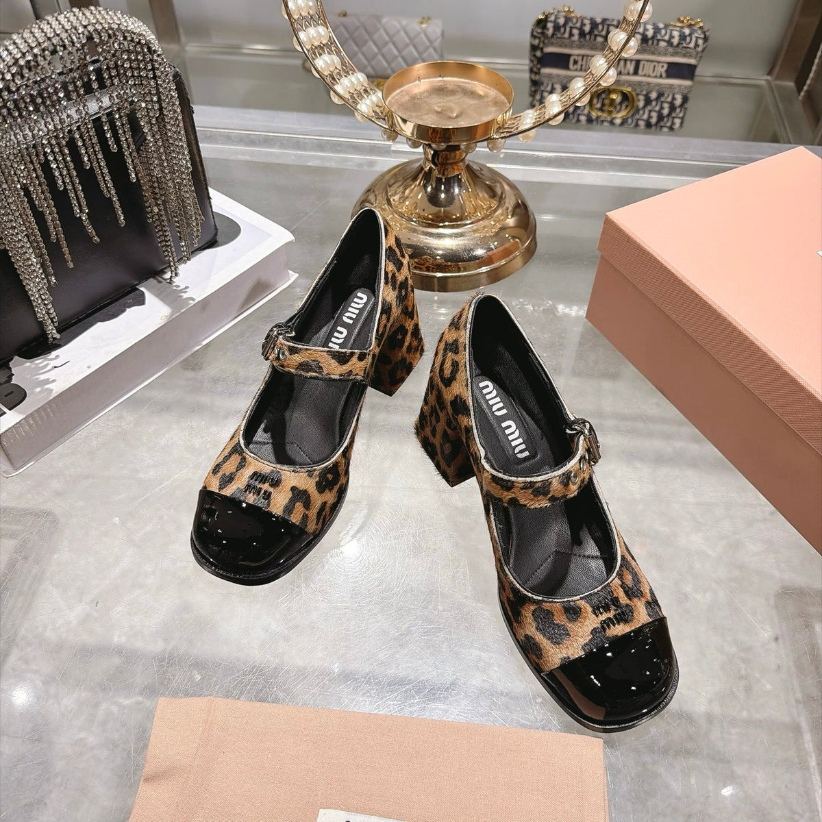 Miu Miu FW26 Two-Tone Mary Jane Pumps 75mm Leopard Pony Hair Black Patent 190485