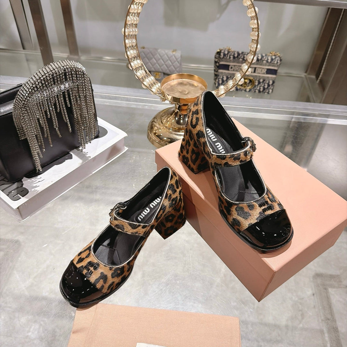 Miu Miu FW26 Two-Tone Mary Jane Pumps 75mm Leopard Pony Hair Black Patent 190485