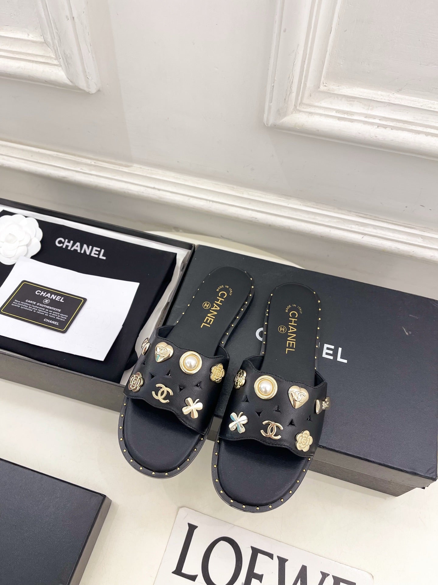 Chanel 26s Flat Sandals Black Lambskin Charm-Decorated