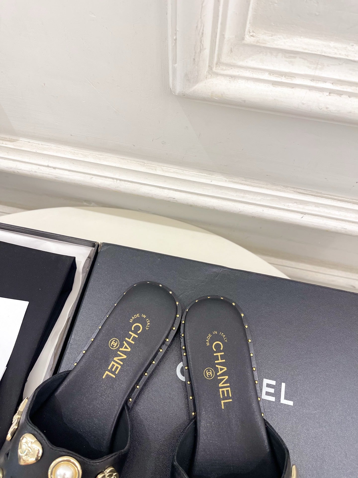 Chanel 26s Flat Sandals Black Lambskin Charm-Decorated