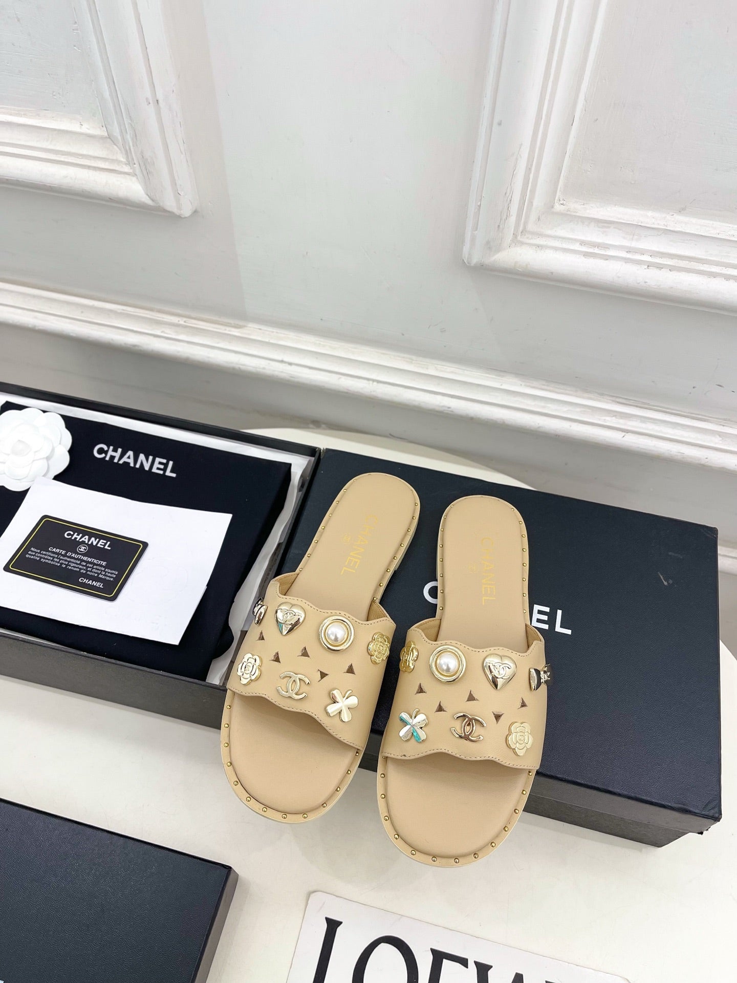Chanel 26s Flat Sandals Beige Lambskin Charm-Decorated