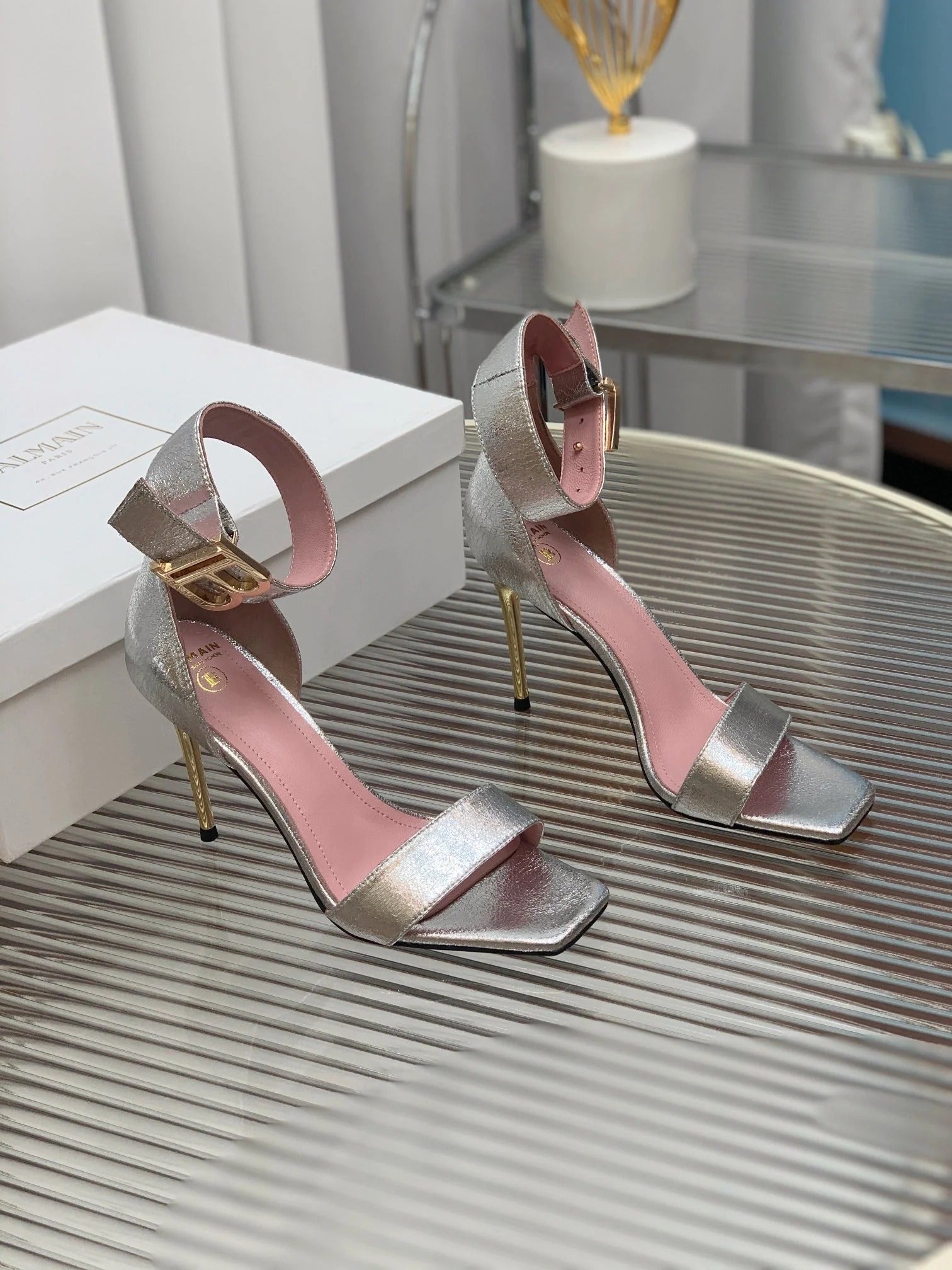 BALMAIN 25S B STRAP HIGH HEEL SANDALS 95MM IN SILVER CALFSKIN