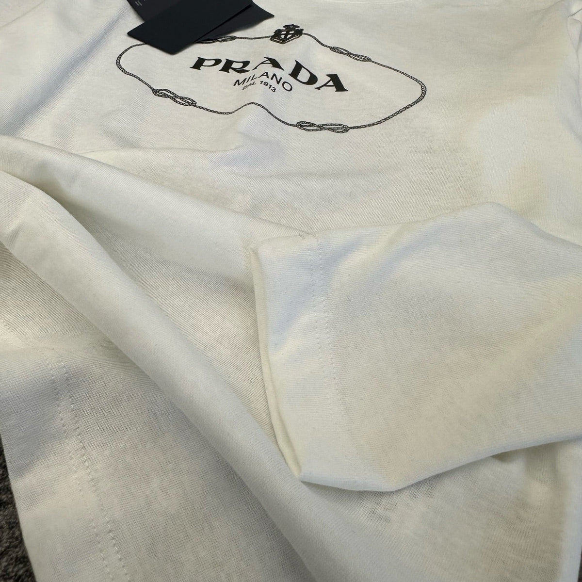 Prad 26FW Long-Sleeved T-Shirt Vintage Oval Logo Cotton 446434